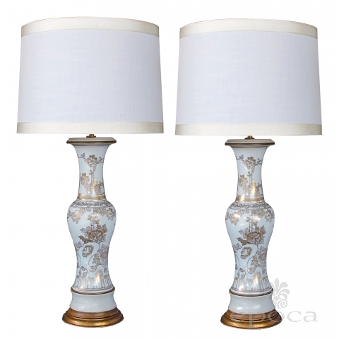 elegant pair of 19th century chinese baluster form vases now mounted as lamps with gilt decoration on a white ground