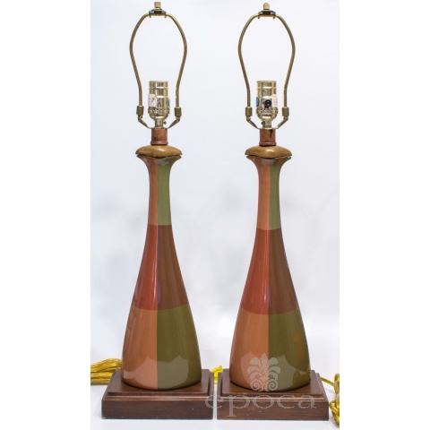 a handsome pair of american orange and olive green ceramic bottle-form lamps