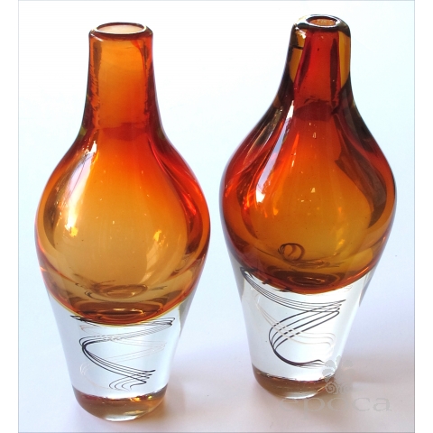  exceptional pair of Kosta Boda Swedish orange art glass vases; designed by Klas-Goran Tinback