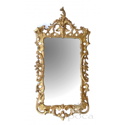 elegant and superbly-carved english george II giltwood mirror with elaborate foliate crest