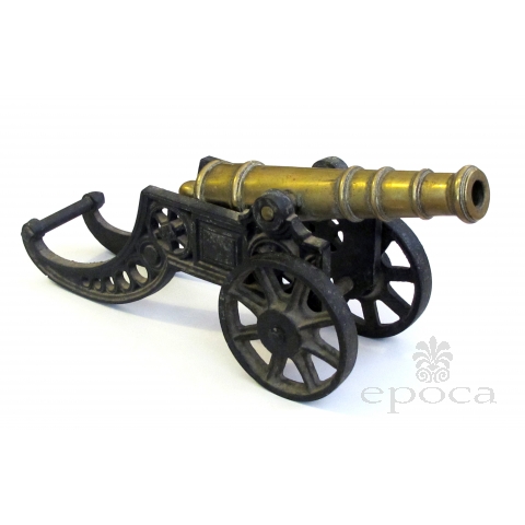 a finely rendered english victorian brass ornamental cannon on cast iron carriage