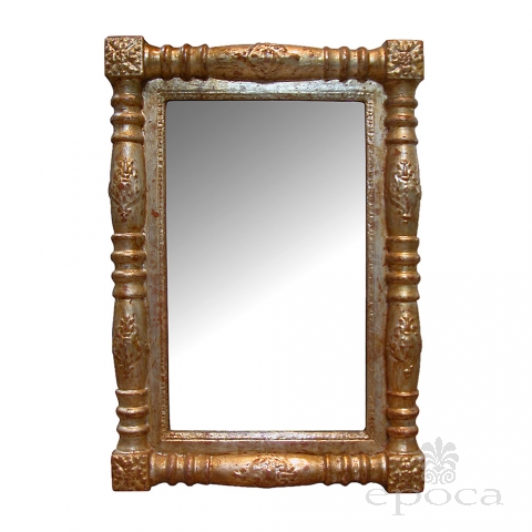 a handsome american empire carved giltwood rectangular mirror
