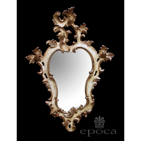 a fanciful venetian rococo revival ivory painted and parcel-gilt cartouche-shaped mirror