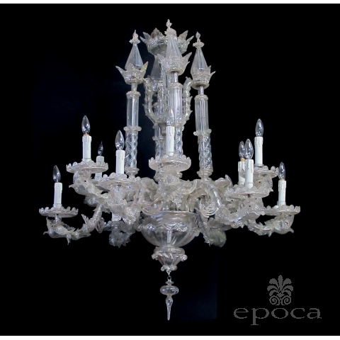 an impressive venetian 12-light chandelier with dolphin-form arms